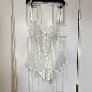 Shirley of Hollywood Size Lg, new w/o tags. Could be used after a wedding. White